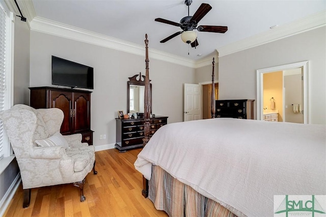 bedroom featuring connected bathroom, crown molding, light hardwood / wood-style floors, and ceiling fan