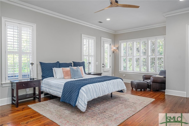 bedroom featuring crown molding, wood-type flooring, access to exterior, and ceiling fan