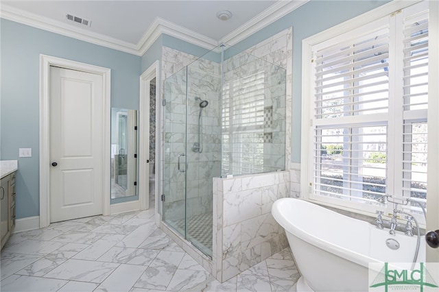 bathroom with vanity, ornamental molding, and independent shower and bath