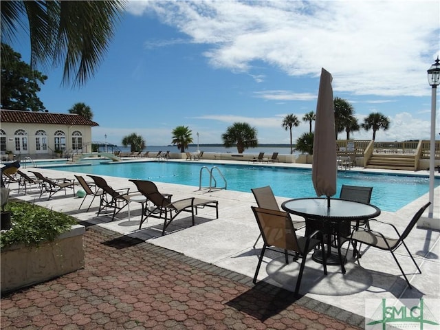 view of pool with a patio