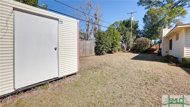 view of yard with a storage shed