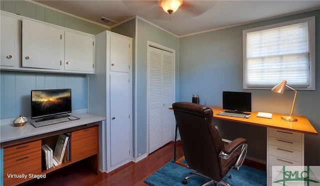 home office with ornamental molding and dark hardwood / wood-style floors