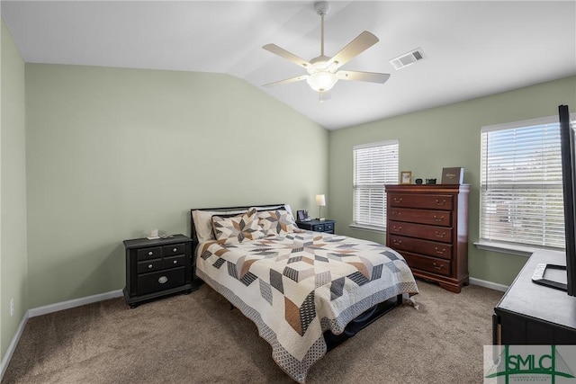 bedroom featuring lofted ceiling, light colored carpet, and ceiling fan