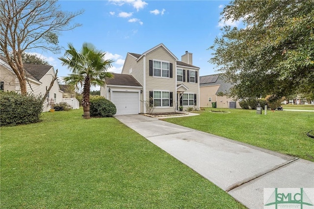 view of front of home featuring a garage and a front yard