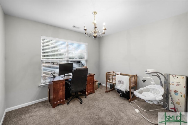 office featuring light carpet and a chandelier