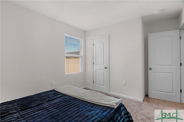 unfurnished bedroom featuring carpet flooring