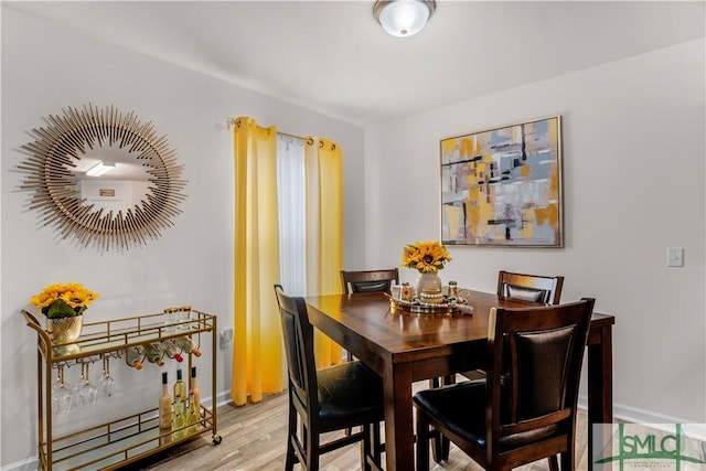 dining room featuring light hardwood / wood-style flooring