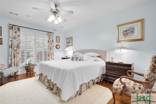 bedroom featuring ceiling fan and wood-type flooring