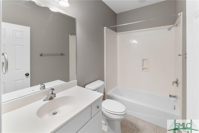 full bathroom featuring tile patterned flooring, vanity, bathtub / shower combination, and toilet