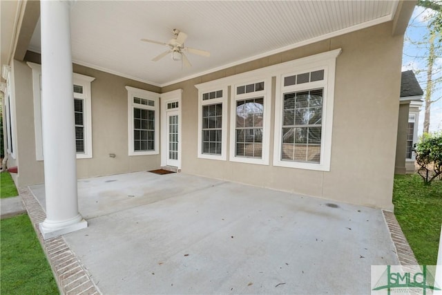 view of patio featuring ceiling fan