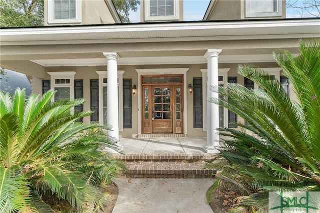 entrance to property with covered porch