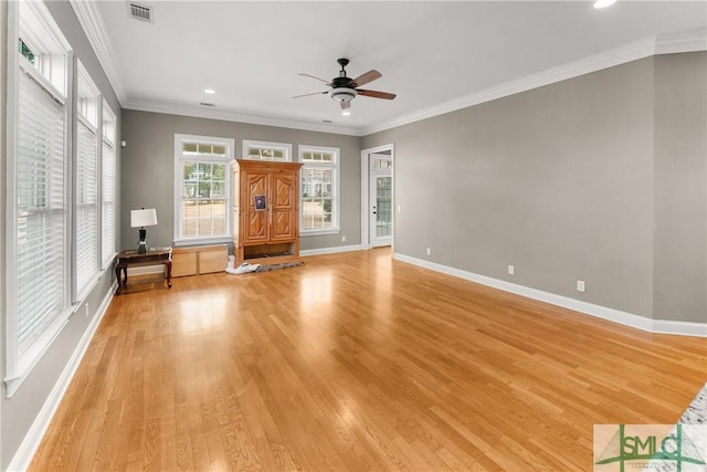 unfurnished living room featuring crown molding, ceiling fan, and light wood-type flooring