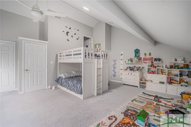 bedroom with high vaulted ceiling and carpet