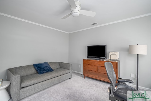 office with ornamental molding, light colored carpet, and ceiling fan