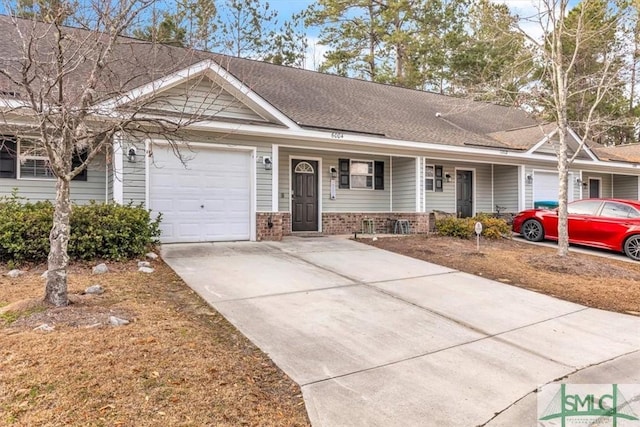 ranch-style house featuring a garage