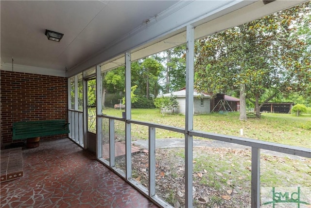 view of unfurnished sunroom