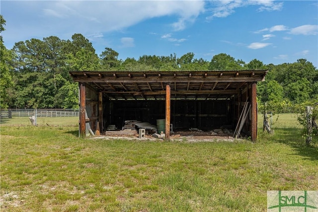 view of outdoor structure with a lawn