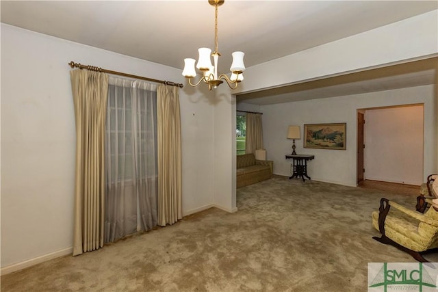 interior space featuring a notable chandelier and carpet floors