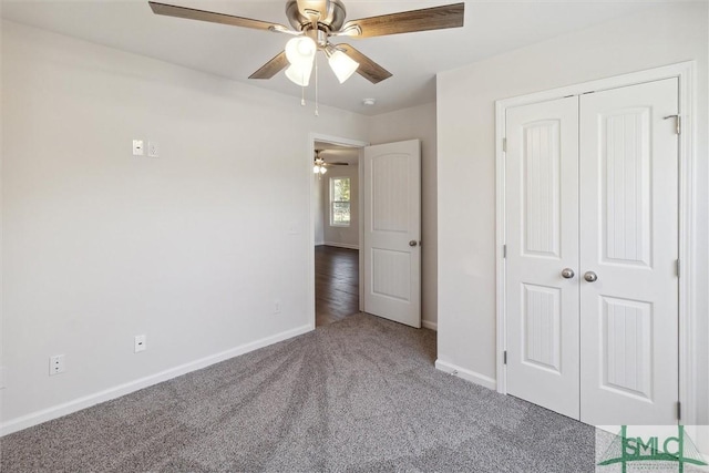 unfurnished bedroom featuring ceiling fan, carpet floors, and a closet