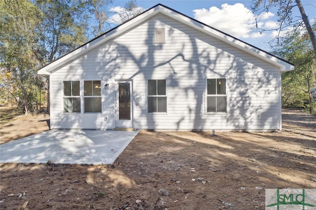 view of front of property with a patio