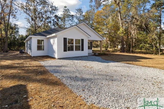 view of front of house featuring cooling unit