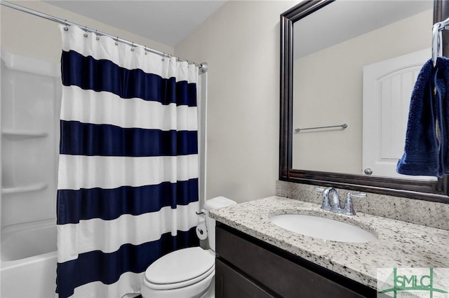 full bathroom featuring vanity, shower / bath combination with curtain, and toilet