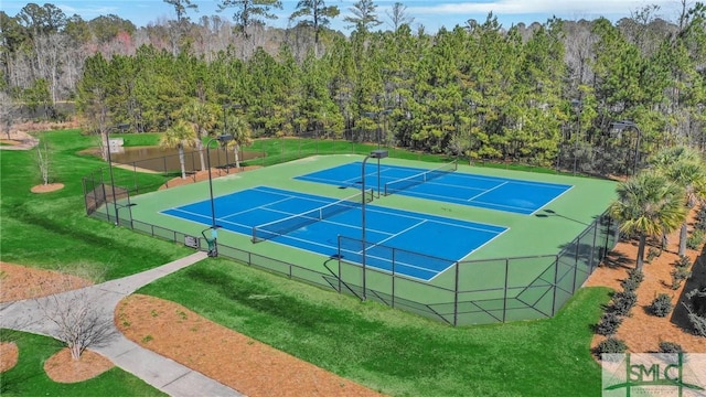 125 Grimsby Rd, Savannah, GA 31407 - view of tennis court featuring a forest view