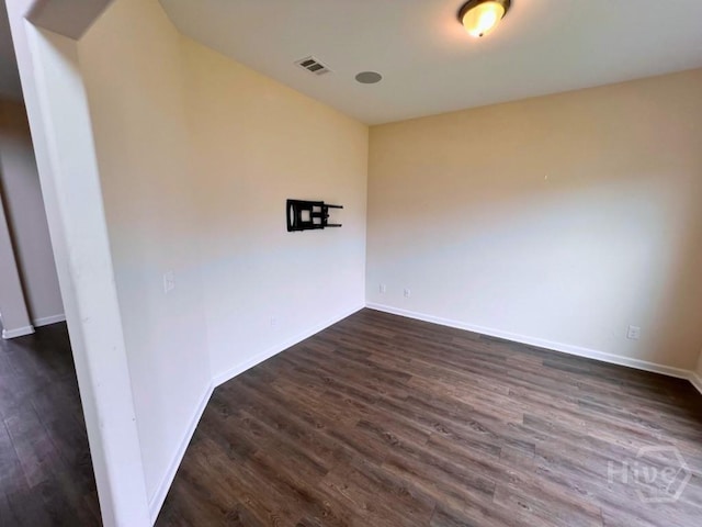 125 Grimsby Rd, Savannah, GA 31407 - empty room with dark wood-style floors and baseboards