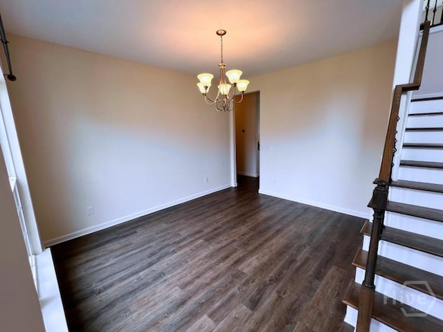 125 Grimsby Rd, Savannah, GA 31407 - unfurnished room featuring stairway, a chandelier, dark wood-style flooring, and baseboards