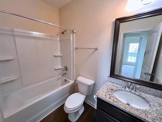 125 Grimsby Rd, Savannah, GA 31407 - bathroom with vanity, toilet, tub / shower combination, wood finished floors, and baseboards