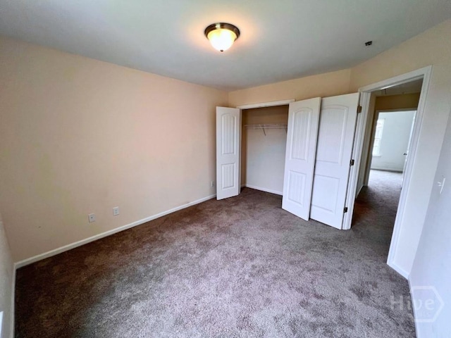 125 Grimsby Rd, Savannah, GA 31407 - unfurnished bedroom featuring carpet, baseboards, and a closet