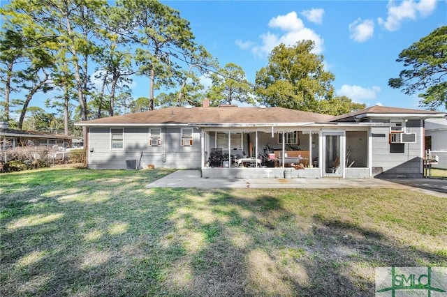 back of property with cooling unit, a yard, a patio, and central air condition unit