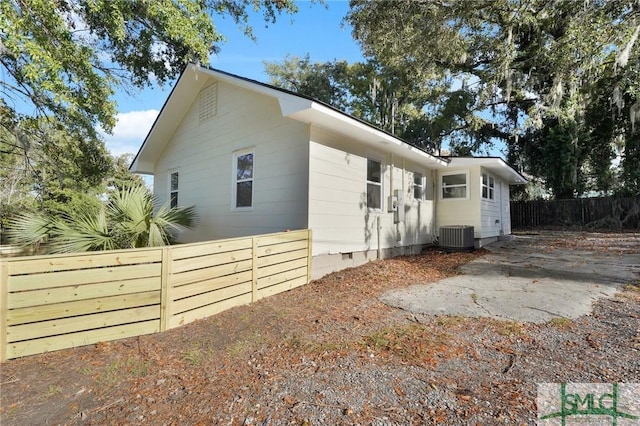 view of property exterior with central air condition unit