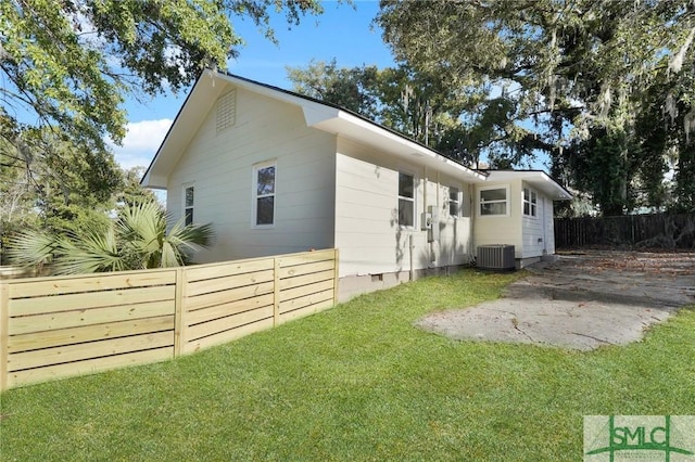 view of property exterior with a yard