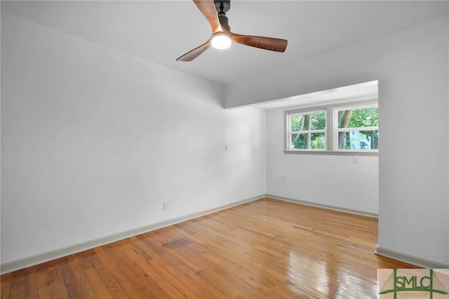 unfurnished room with light hardwood / wood-style flooring and ceiling fan