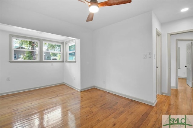 spare room with ceiling fan and light hardwood / wood-style flooring