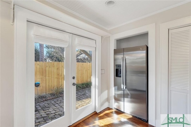 doorway featuring hardwood / wood-style flooring and french doors