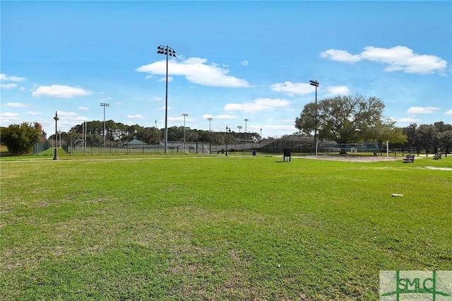 view of property's community featuring a lawn