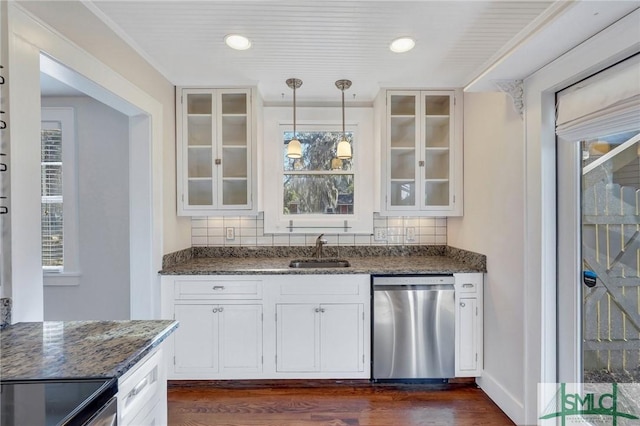 bar with sink, range with electric stovetop, dishwasher, pendant lighting, and white cabinets