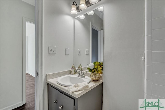 bathroom featuring vanity and wood-type flooring