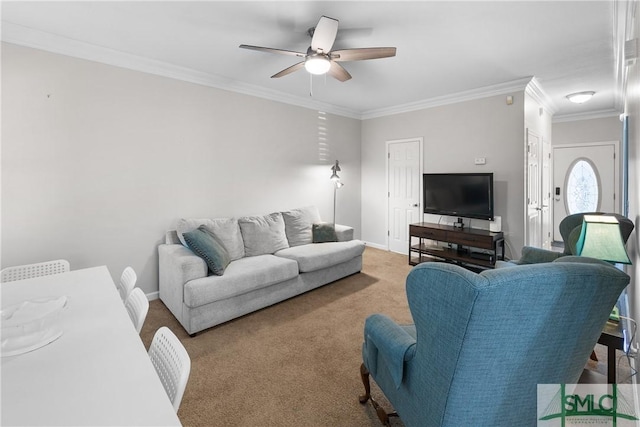 living room with ceiling fan, ornamental molding, and carpet floors