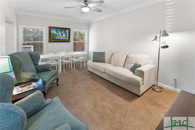 carpeted living room with crown molding and ceiling fan