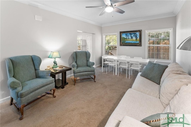 carpeted living room featuring crown molding and ceiling fan