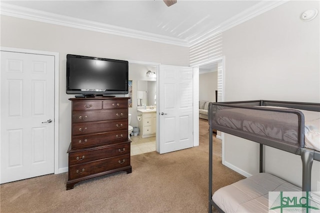 bedroom with crown molding and light carpet