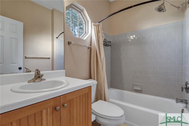 full bathroom with vanity, shower / bathtub combination with curtain, and toilet