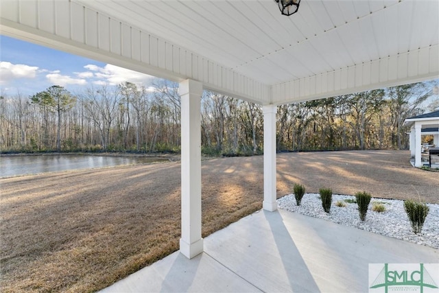 view of patio / terrace featuring a water view