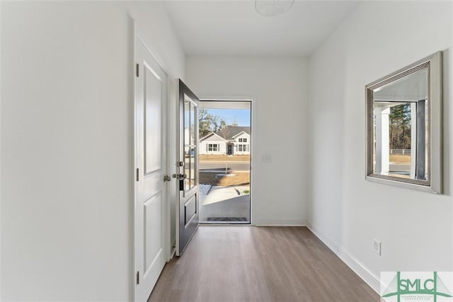 doorway featuring hardwood / wood-style flooring