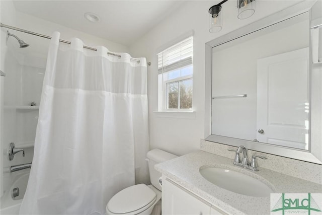 full bathroom featuring vanity, toilet, and shower / bath combo