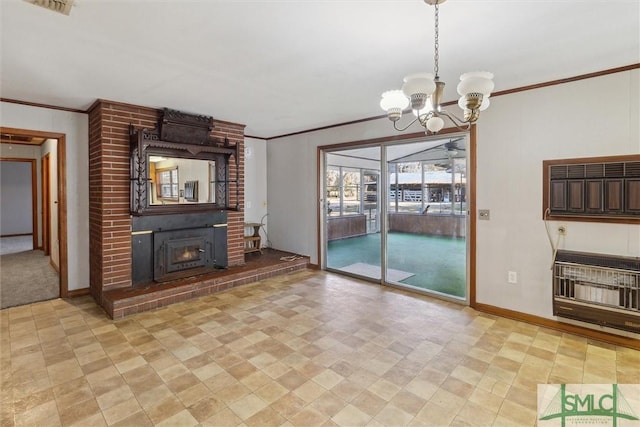 unfurnished living room featuring heating unit, a notable chandelier, and crown molding