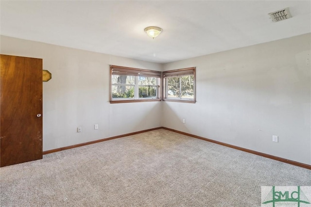 view of carpeted spare room